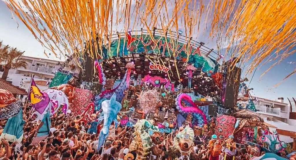 Meta description: Explore the spectacle of elrow's summer events at Ushuaïa Ibiza. Immerse in extraordinary nights of music, art, and surreal party atmosphere.