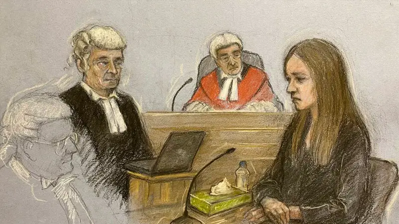 An artist’s sketch by Elizabeth Cook of Lucy Letby being questioned by her defence lawyer Ben Myers in the dock at Manchester Crown Court
